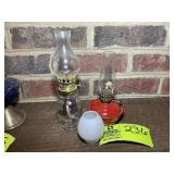 PAIR OF SMALL OIL LAMPS, RED 6 IN , CLEAR, 8 IN