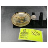 JUSTIN BELT COMPANY, NICKLE SILVER BELT BUCKLE, AN