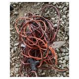 GROUP OF ORANGE AND RED EXTENSION CORDS