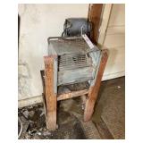 SQUIRREL CAGE FAN ON WOODEN STAND