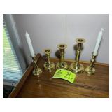 GROUP OF BRASS COLORED CANDLESTICK HOLDERS 4 IN TO