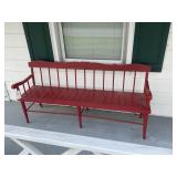 RED WOODEN BENCH ON FRONT PORCH, 70 IN LONG