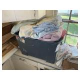 TOTE WITH MISC BLANKETS AND QUILTS