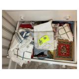 DRAWER WITH MISC DISH TOWELS, POT HOLDERS, ETC