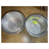 PAIR OF ALUMNIUM BOWLS, 16 IN AND 17 IN DIAMETER