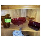 SHELF WITH AMBER PITCHER, RED BOWLS, ORANGE PEDEST