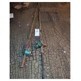 TWO VINTAGE FISHING POLES AND REELS