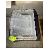 GROUP OF CLEAR PLASTIC STORAGE TOTES