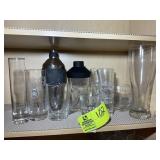 SHELF WITH SHAKERS AND MISC MIXED DRINK GLASSES, S