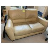 CREAM COLOR LEATHER LOVE SEAT, APPROX 63 IN LONG