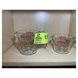 PAIR OF PYREX GLASS MEASURING CUPS