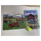 PAIR OF METAL SIGNS, FARMALL AND HARTLAND OF AMERI