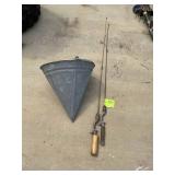 GROUP INCLUDING TWO VINTAGE FISHING RODS, AND FIRE