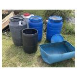 GROUP OF PLASTIC BARRELS