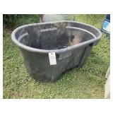 APPEARS TO BE 100 GAL BLACK PLASTIC STOCK TANK