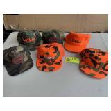 GROUP OF LUFKIN TRUCKER HATS, CAMMO, ORANGE, ETC