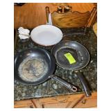 GROUP OF FRYING PANS