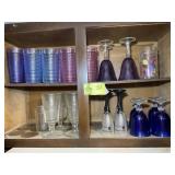 CONTENTS OF CABINET ABOVE FREEZER IN LAUNDRY, PLAS