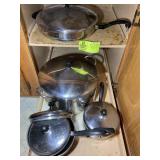 CABINET WITH ASSORTED POTS AND PANS