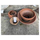 GROUP OF TERRA-COTTA STYLE PLANTERS