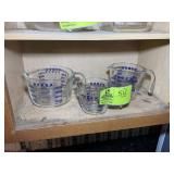 GROUP OF PYREX GLASS MEASURING CUPS