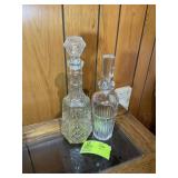 PAIR OF DECANTERS, 12 IN AND 14 IN TALL