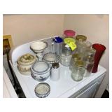 CONTENTS ON TOP OF DRYER, PLANTERS, CANNING JARS,