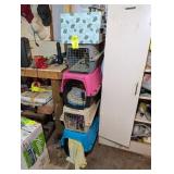 GROUP OF FOUR PET CARRIERS SMALL TO MEDIUM SIZE AN