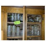 TOP TWO SHELVES OF ASSORTED DRINKING GLASSES, VASE