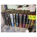BOTTOM SHELF OF ASSORTED BOOKS