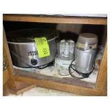 CONTENTS OF BOTTOM SHELF OF CABINET BLACK& DECKER