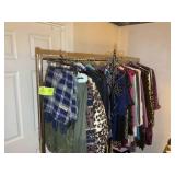 LARGE ROLLING CLOTHES RACK  63 IN L X 69 IN H AND