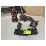 GROUP OF ORIENTAL THEMED STATUES, 6 IN TO 10.5 IN