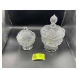 TWO DECORATIVE CLEAR GLASS PEDISTAL BOWLS, WITH LI