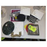 GROUP OF TRIVETS AND TRAYS