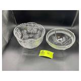 TWO DECORATIVE CLEAR GLASS BOWLS