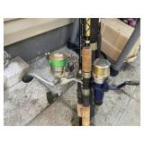 GROUP OF 4 MISC FISHING POLES AND REELS