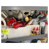 SHELF WITH MISC OILS, YARD CHEMICALS
