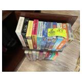 BOTTOM CABINET CHILDREN VCR TAPES MISC BOOKS AND A
