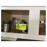 MISC BOWLS CUPS MEASURING CUPS ABOVE MICROWAVE
