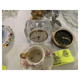 CLOCKS CANDLE STICKS AND CREAM AND SUGAR AND BOWLS