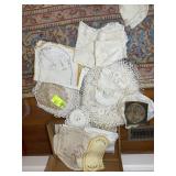 GROUP OF TABLE CLOTHES AND DOILIES
