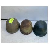GROUP OF THREE VINTAGE MILITARY STYLE HELMETS