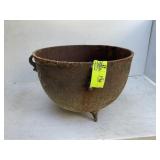 LARGE-FOOTED CAST IRON POT 20 IN DIAMETER APPROXIM