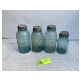 GROUP OF BLUE GLASS BALL JARS WITH ZINC LIDS