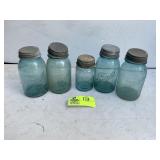 GROUP OF BLUE GLASS BALL JARS WITH ZINC LIDS