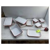 GROUP OF RED RIMMED ENAMEL PANS, SOME WITH LIDS