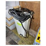 TRASH CAN WITH HOME MADE EXTENSION CORD