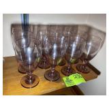 GROUP OF PURPLE STEMMED GLASSWARE