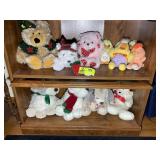 TWO SHELVES OF STUFFED ANIMALS